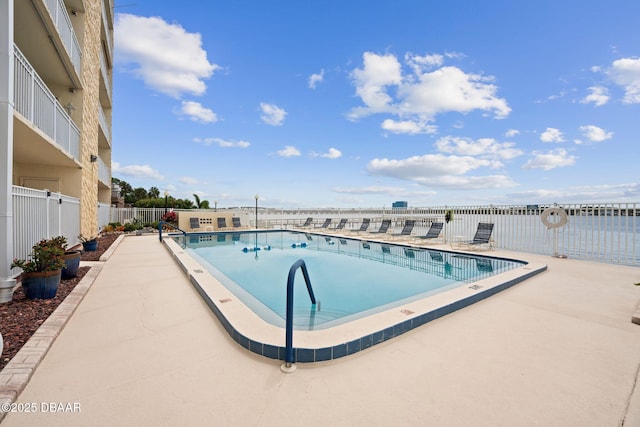 view of pool featuring a patio