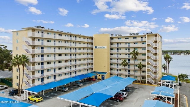 145 N Halifax Ave Unit 105, Daytona Beach, FL 32118 - view of property with uncovered parking