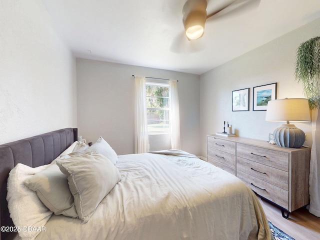 903 Conrad Dr, New Smyrna Beach, FL 32168 - bedroom featuring light wood-style floors and a ceiling fan