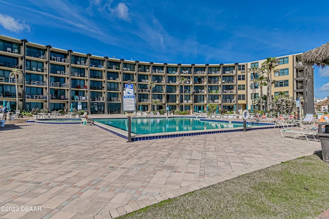 view of swimming pool with a patio area