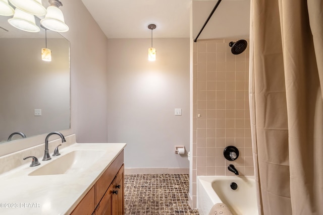 bathroom featuring tile patterned flooring, vanity, and shower / tub combo