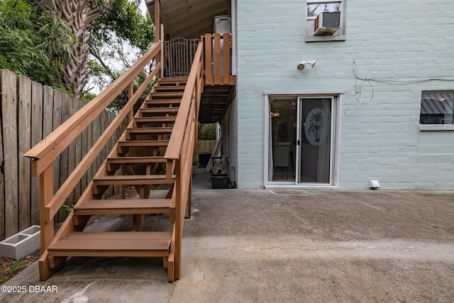 127 Bosarvey Dr, Ormond Beach, FL 32176 - entrance to property featuring cooling unit and a patio area