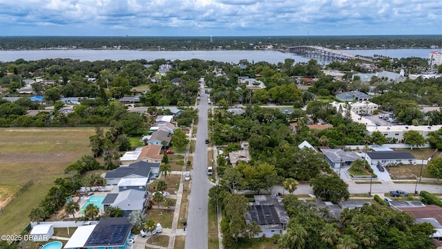 127 Bosarvey Dr, Ormond Beach, FL 32176 - aerial view of residential area featuring a nearby body of water and a notable bridge