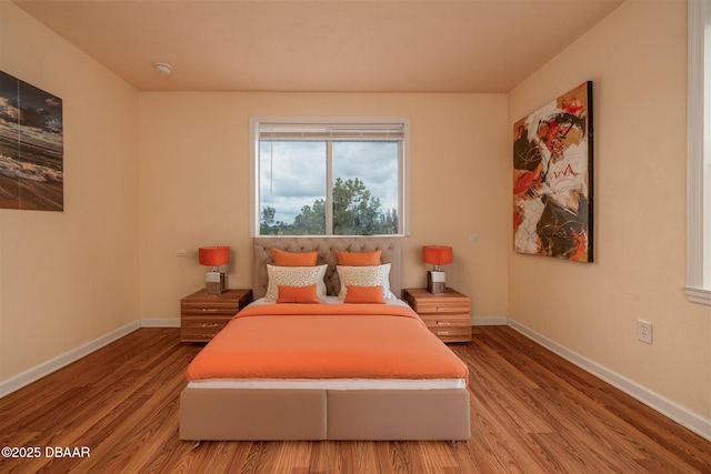 127 Bosarvey Dr, Ormond Beach, FL 32176 - bedroom with wood finished floors and baseboards