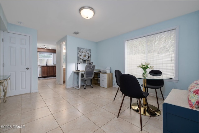 127 Bosarvey Dr, Ormond Beach, FL 32176 - office with light tile patterned flooring and baseboards