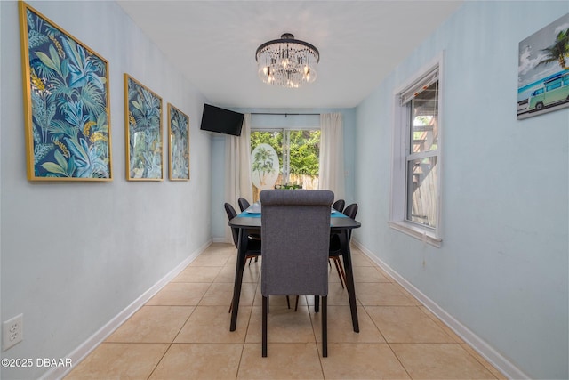 127 Bosarvey Dr, Ormond Beach, FL 32176 - dining space with a chandelier and tile patterned flooring