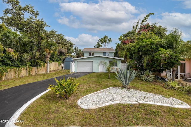 127 Bosarvey Dr, Ormond Beach, FL 32176 - view of front facade featuring driveway, an attached garage, and stucco siding