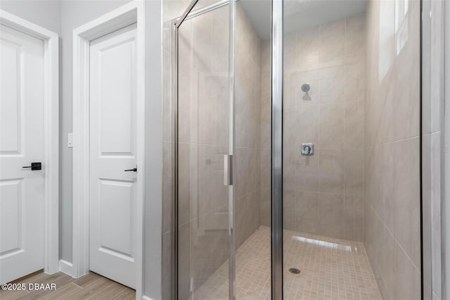 21 Weymouth Ln, Palm Coast, FL 32164 - bathroom with a shower stall and wood finished floors