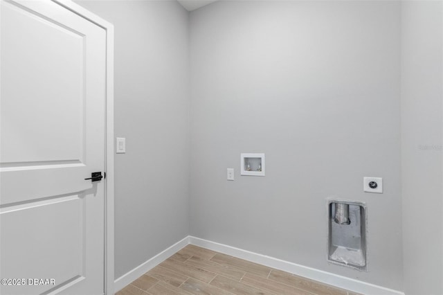 21 Weymouth Ln, Palm Coast, FL 32164 - laundry room with hookup for an electric dryer, washer hookup, and wood finish floors