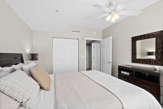 bedroom with ceiling fan and a closet