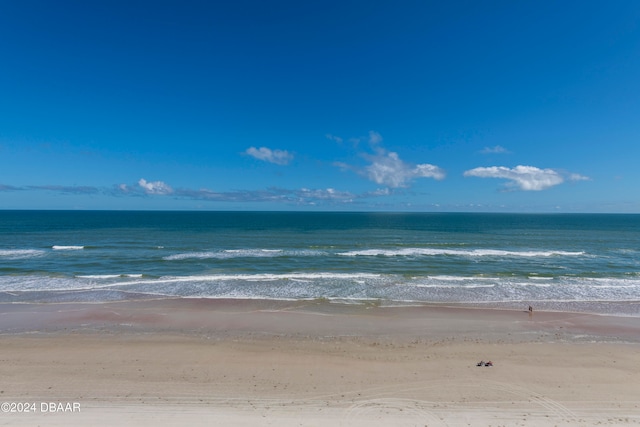 view of water feature with a beach view