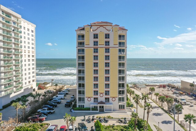 view of building exterior with a water view