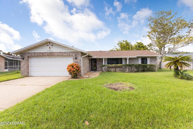 ranch-style home with a front yard and a garage