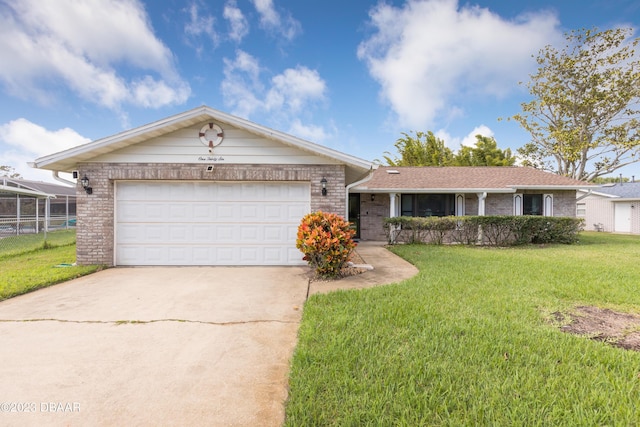 ranch-style house with a front lawn and a garage