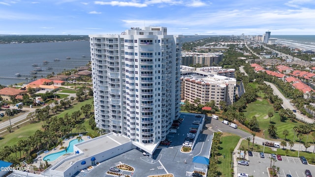 bird's eye view with view of golf course and a water view