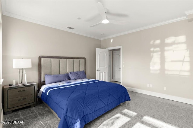 carpeted bedroom featuring visible vents, baseboards, a ceiling fan, and crown molding