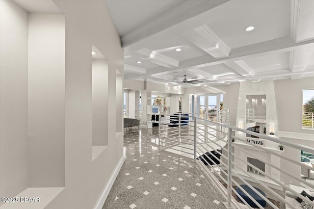 corridor featuring carpet floors, beam ceiling, an upstairs landing, recessed lighting, and coffered ceiling