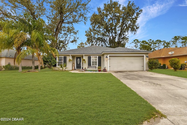 single story home with a front lawn and a garage