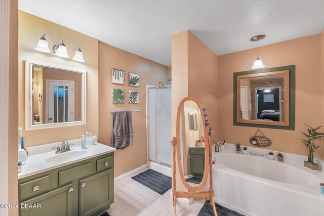10 Pine Brook Dr, Palm Coast, FL 32164 - bathroom with shower with separate bathtub, tile patterned floors, and vanity