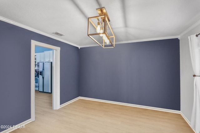 10 Pine Brook Dr, Palm Coast, FL 32164 - empty room featuring hardwood / wood-style floors and ornamental molding