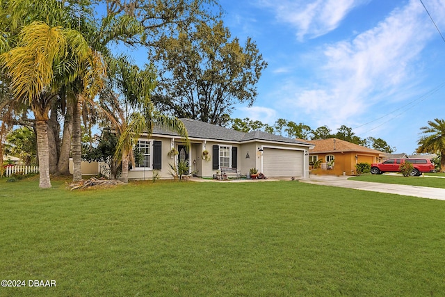 single story home with a garage and a front lawn