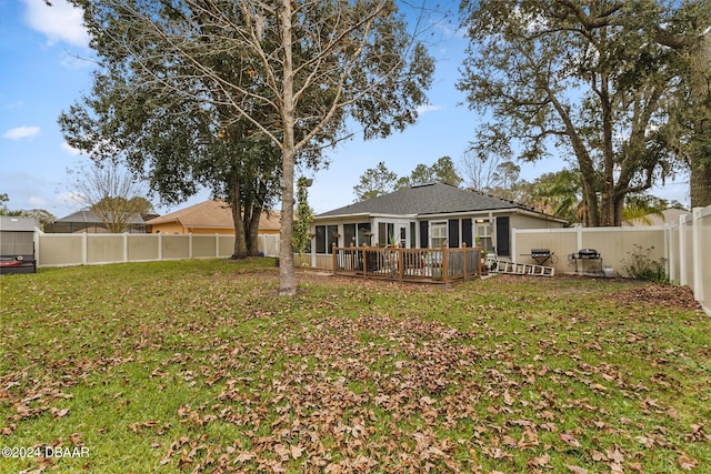 10 Pine Brook Dr, Palm Coast, FL 32164 - rear view of house featuring a deck and a yard