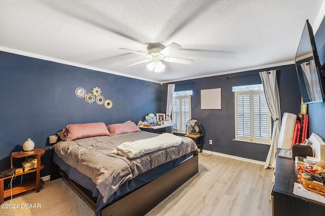 10 Pine Brook Dr, Palm Coast, FL 32164 - bedroom with a textured ceiling, light hardwood / wood-style flooring, ornamental molding, and ceiling fan