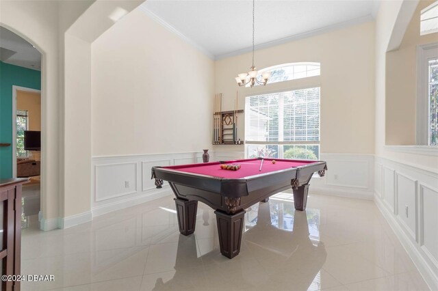 playroom featuring a chandelier, light tile patterned floors, billiards, and crown molding