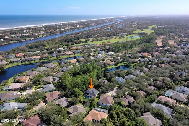 birds eye view of property featuring a water view