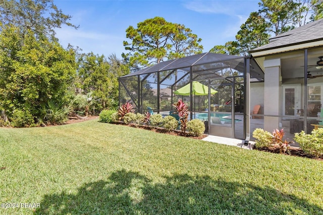 view of yard featuring a lanai