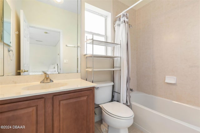 full bathroom with tile patterned flooring, vanity, toilet, and shower / tub combo