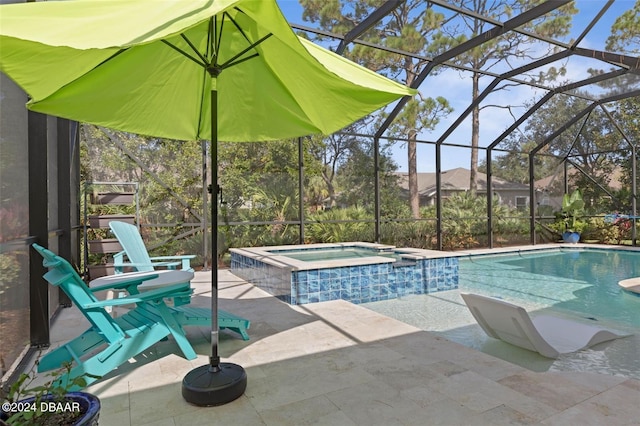 view of swimming pool with glass enclosure, a patio area, and an in ground hot tub