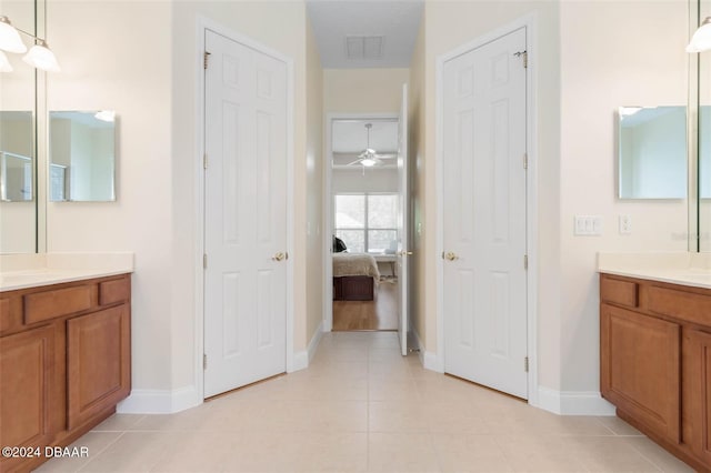 bathroom with vanity, tile patterned floors, and ceiling fan