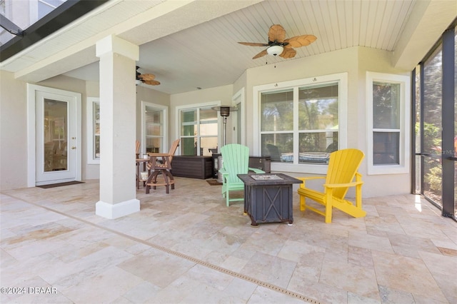 view of patio / terrace featuring ceiling fan