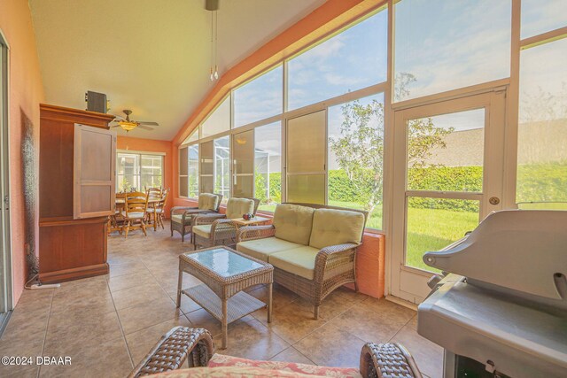 sunroom / solarium with lofted ceiling and ceiling fan