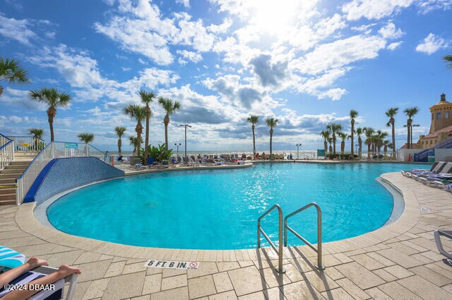 350 N Atlantic Ave Unit 2124, Daytona Beach, FL 32118 - view of pool with a patio area