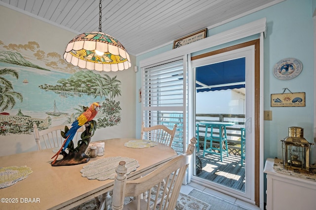 dining room with wooden ceiling