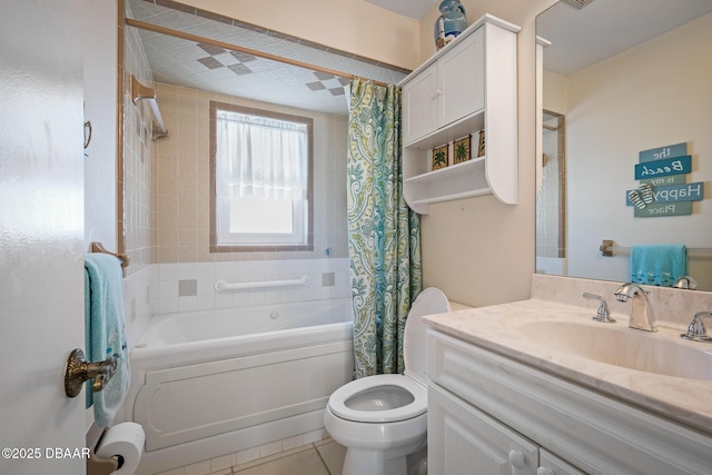 full bathroom with vanity, shower / tub combo, tile patterned floors, and toilet