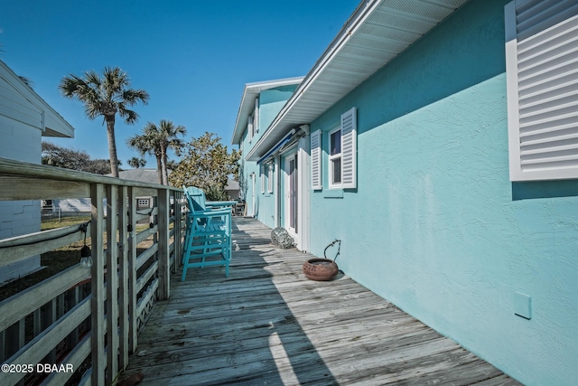 view of property exterior featuring a deck