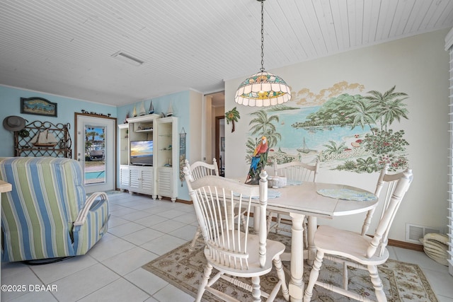 tiled dining space featuring wooden ceiling