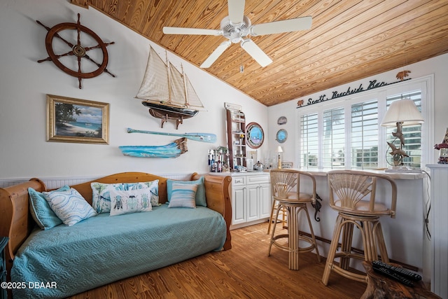 interior space with wood ceiling, vaulted ceiling, and light wood-type flooring