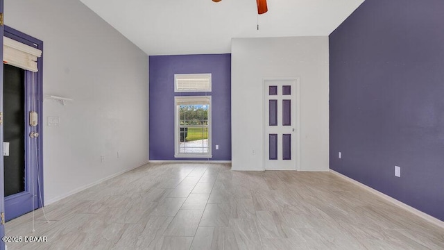 unfurnished room with ceiling fan