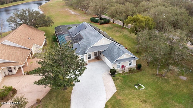 birds eye view of property featuring a water view