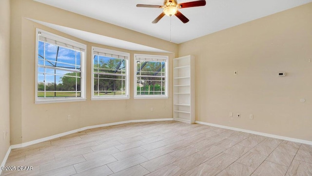 unfurnished room featuring ceiling fan