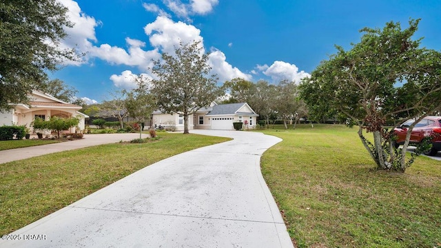 view of front of property with a front lawn and a garage