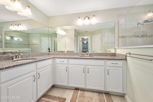 118 Bird Of Paradise Dr, Palm Coast, FL 32137 - bathroom with double vanity, walk in shower, and tile patterned flooring