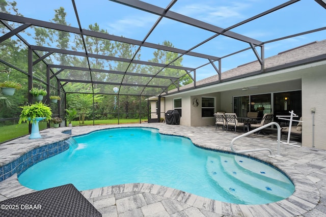 118 Bird Of Paradise Dr, Palm Coast, FL 32137 - outdoor pool featuring a patio area, a ceiling fan, and glass enclosure
