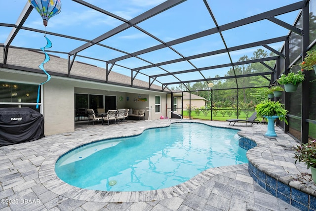 118 Bird Of Paradise Dr, Palm Coast, FL 32137 - swimming pool with a patio area, area for grilling, an outdoor living space, and a lanai