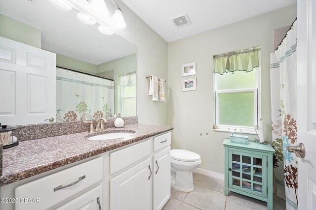 118 Bird Of Paradise Dr, Palm Coast, FL 32137 - bathroom with vanity, tile patterned flooring, and a shower with shower curtain
