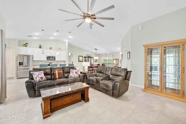 118 Bird Of Paradise Dr, Palm Coast, FL 32137 - living area featuring ceiling fan, light tile patterned floors, and high vaulted ceiling